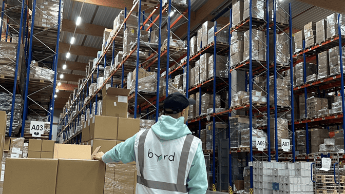 worker in a byrd warehouse